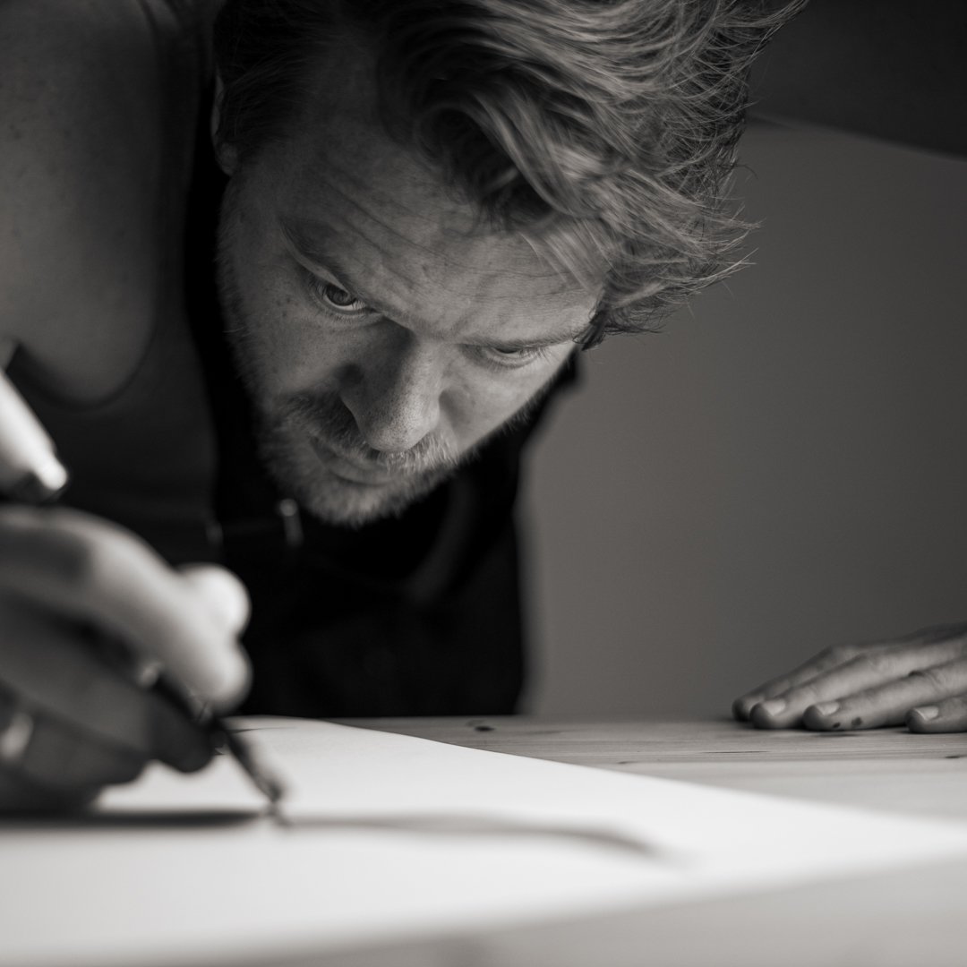 Gabriel at work, lettering by hand